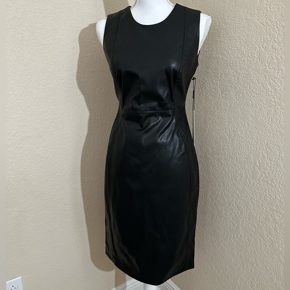 Go with the faux with Calvin Klein's chic, faux-leather sheath dress.